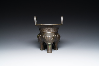 A Chinese archaic bronze tripod censer, 'ding', Ming