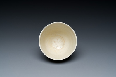 A Chinese white-glazed wine cup, probably Sui