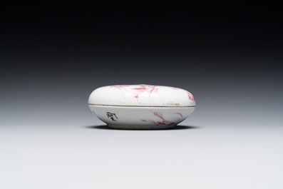 A Chinese purple-decorated seal paste box and cover with a landscape, signed Qing 慶, Mei 美 seal mark, dated 1923