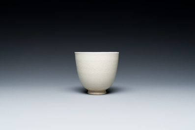 A Chinese white-glazed wine cup, probably Sui