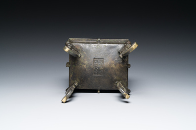 A Chinese archaic bronze ritual food vessel in Western Zhou-style, 'fangding', Bao Ding Zhen Yong 寶鼎珍用 mark, Ming