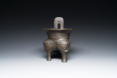 A Chinese archaic bronze tripod censer, 'ding', Ming