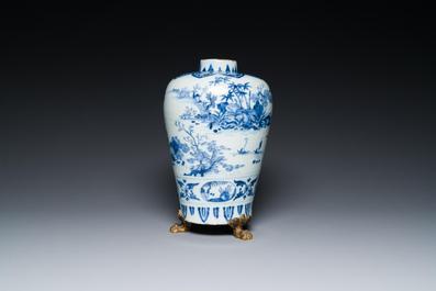 A fine Dutch Delft blue and white Transitional style chinoiserie vase on a gilt bronze stand, late 17th C.