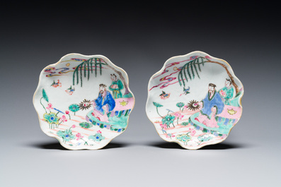 A pair of Chinese relief-decorated famille rose 'lotus' cups and saucers with a scholar and his servant, Yongzheng