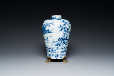 A fine Dutch Delft blue and white Transitional style chinoiserie vase on a gilt bronze stand, late 17th C.