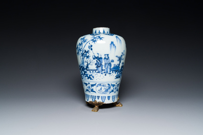 A fine Dutch Delft blue and white Transitional style chinoiserie vase on a gilt bronze stand, late 17th C.