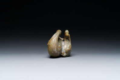 A Chinese celadon jade group of two mandarin ducks, Ming