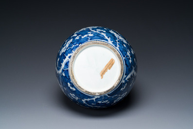 A Chinese blue and white double gourd 'prunus on cracked ice' vase, 18th C.