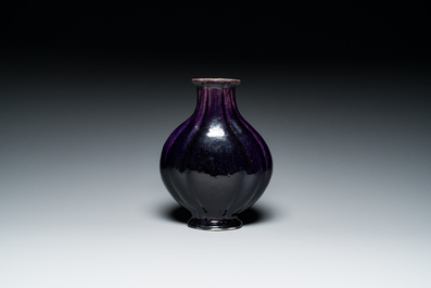 A Chinese monochrome aubergine-glazed vase, 19th C.