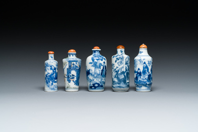 Five Chinese blue, white and wucai snuff bottles, 19th C.