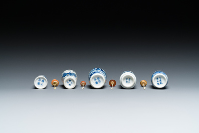 Five Chinese blue, white and wucai snuff bottles, 19th C.