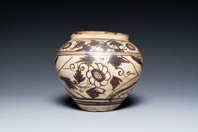 A Chinese Cizhou pottery jar with floral design, Song