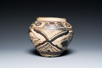 A Chinese Cizhou pottery jar with floral design, Song