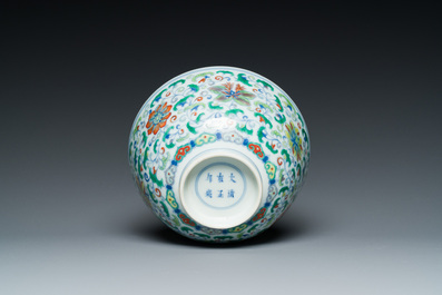 A Chinese doucai bowl with floral design, Yongzheng mark, 19/20th C.