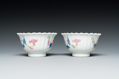 A pair of Chinese famille rose chrysanthemum-shaped cups and saucers, Yongzheng