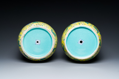 A pair of Chinese famille rose yellow-ground 'dragon' vases, Qianlong mark, Republic