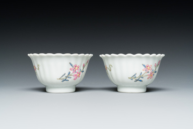 A pair of Chinese famille rose chrysanthemum-shaped cups and saucers, Yongzheng