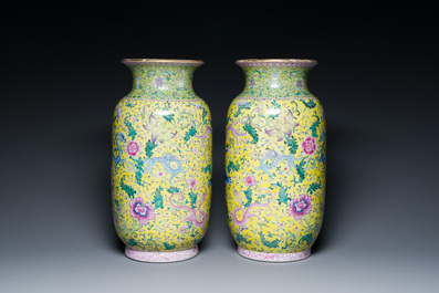 A pair of Chinese famille rose yellow-ground 'dragon' vases, Qianlong mark, Republic