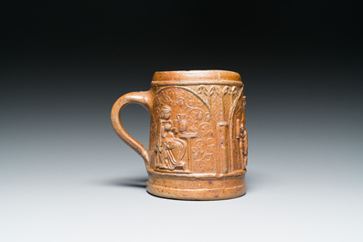 An unusual German stoneware mug depicting king Gambrinus, Cologne or Frechen, ca. 1600