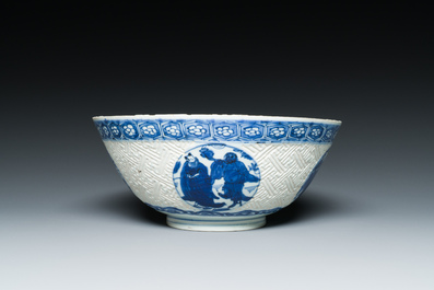 A Chinese blue and white 'Shou Lao' bowl with carved exterior, Chenghua mark, Wanli