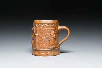 An unusual German stoneware mug depicting king Gambrinus, Cologne or Frechen, ca. 1600