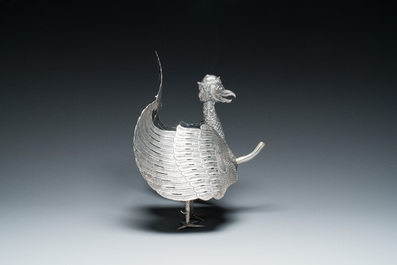 A rare Indonesian silver 'Garuda' oil lamp for the Wayang theatre, 'blencong', 19th C.