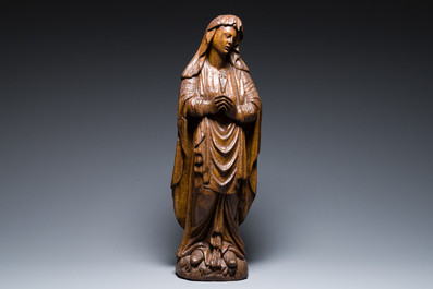 A Flemish carved oak figure of Mary Magdalen from a Crucifixion group, 16th C.