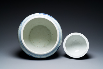 Two Chinese blue and white fish bowls or jardini&egrave;res with figurative design and mythical animals, 19/20th C.