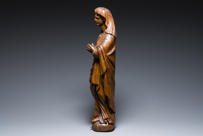 A Flemish carved oak figure of Mary Magdalen from a Crucifixion group, 16th C.