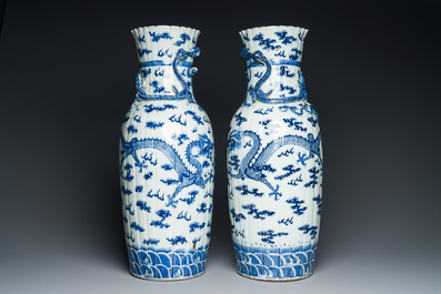 A pair of Chinese blue and white 'dragon' vases, 19th C.