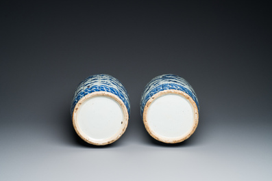 A pair of Chinese blue and white 'dragon' vases, 19th C.