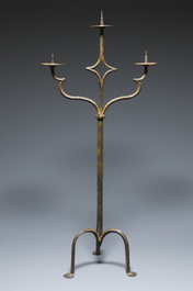 A large French gothic wrought iron three-lights candlestick, ca. 1500