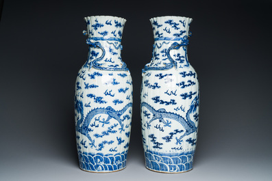 A pair of Chinese blue and white 'dragon' vases, 19th C.