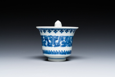 A Chinese blue and white trick cup, 'gong dao bei', 19th C.