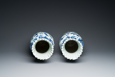 A pair of Chinese blue and white 'dragon' vases, 19th C.