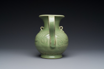 A Chinese Longquan celadon wine ewer with anhua design, Yuan/Ming