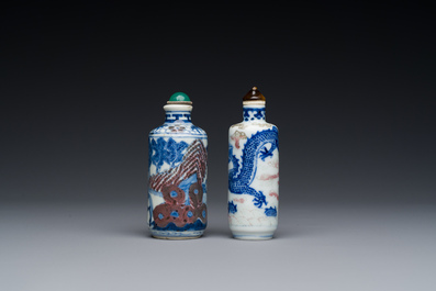 Two Chinese blue, white and copper-red snuff bottles, 19th C.