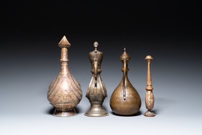 A varied collection of Islamic copper and tin utensils, 19/20th C.