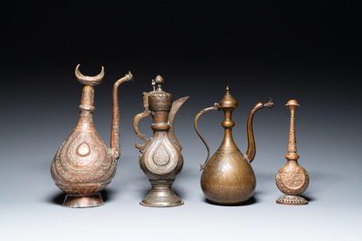 A varied collection of Islamic copper and tin utensils, 19/20th C.