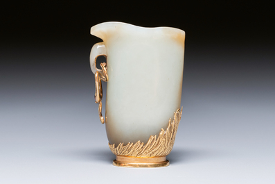 A Chinese jade rhyton with 18k gold mount, 19th C.