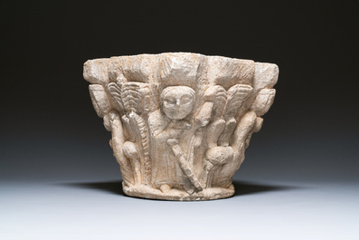 A carved figurative sandstone capital, France or Spain, probably 14th C.