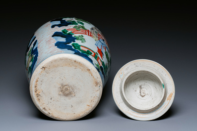 A Chinese wucai vase and cover with narrative design, Transitional period