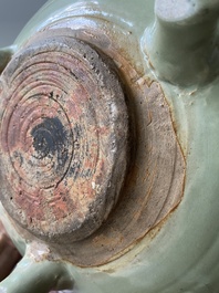 A Chinese Longquan celadon tripod censer with underglaze decoration, Ming