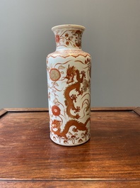 A Chinese iron-red and gilt rouleau 'dragons' vase, Kangxi