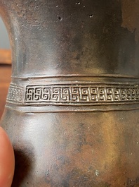 A Chinese inscribed archaic bronze ritual wine vessel, 'zhi', late Shang dynasty