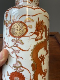 A Chinese iron-red and gilt rouleau 'dragons' vase, Kangxi