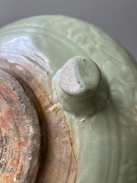 A Chinese Longquan celadon tripod censer with underglaze decoration, Ming