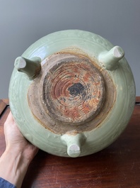 A Chinese Longquan celadon tripod censer with underglaze decoration, Ming