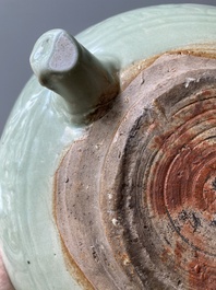 A Chinese Longquan celadon tripod censer with underglaze decoration, Ming