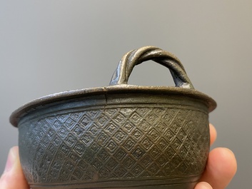 Two Chinese ritual bronze tripod food vessels, 'ding', Western Zhou and Yuan